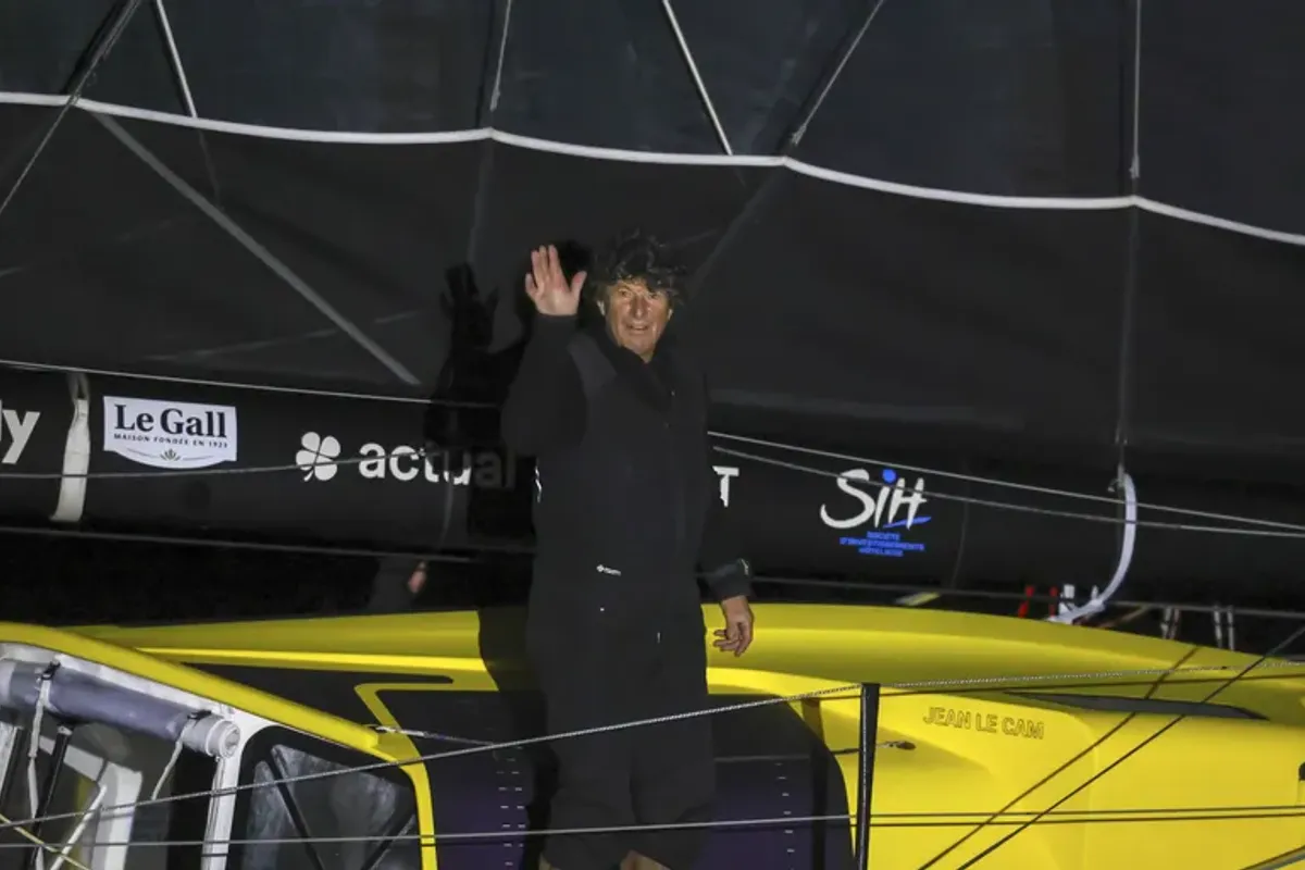 Isabelle Joschke, Jean Le Cam  & Conrad Colman cross the Vendée Globe finish line